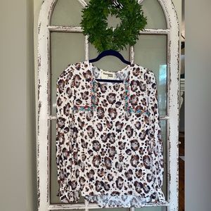 Savannah Jane long sleeve top with embroidery.